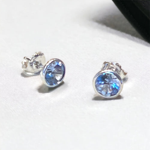 Light Blue Sapphire Stud Earring Wrapped in Sterling Silver