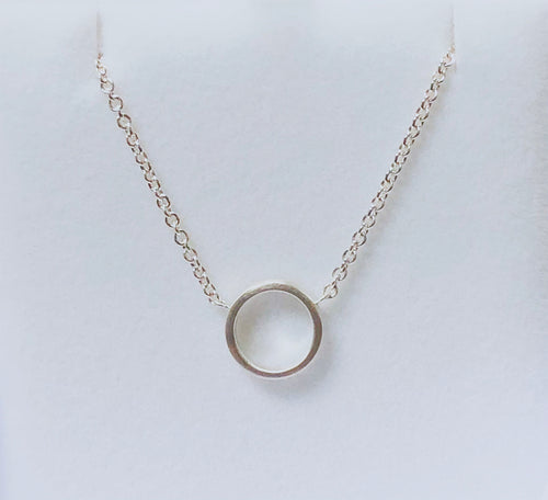 Tiny Circle Pendant in Sterling Silver